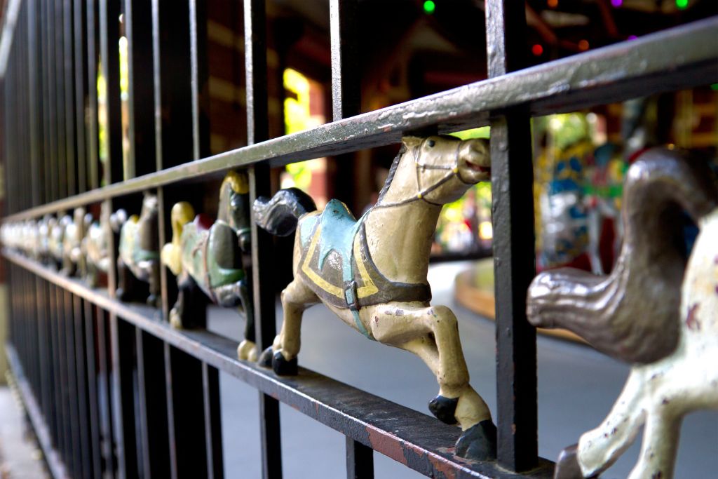 Gate with horses that surrounds the Central Park Carousel. 