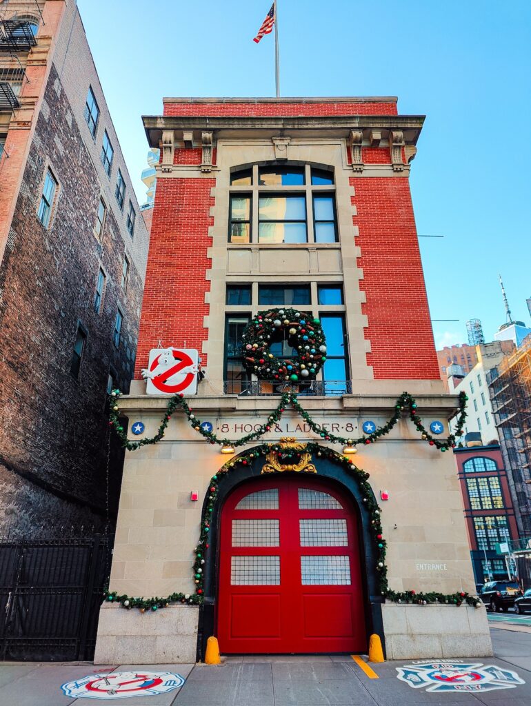 View of the exterior of the Ghost Busters Fire House at Christmas.