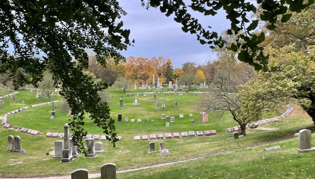View of a circle of graves inside of Greenwood Cemtery.