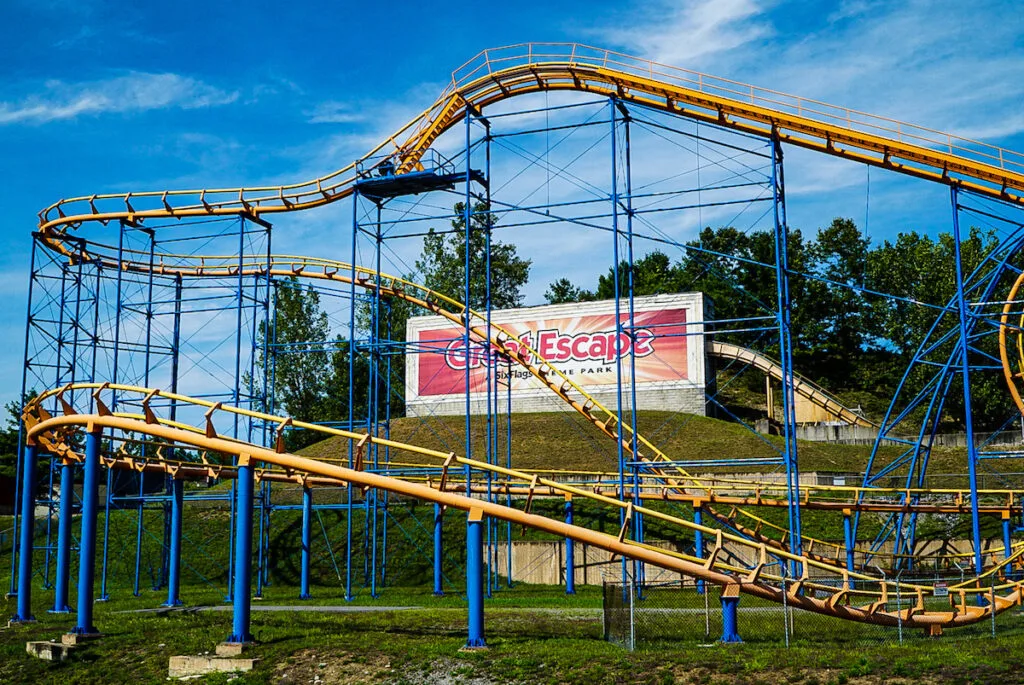 View of a roller coaster and a sign for the Great Escape in Lake George, NY. 