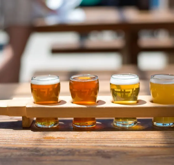 A selection of four craft beers that make up a beer flight from one of the best breweries in Lake George.
